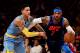 LOS ANGELES, CA - JANUARY 03: Carmelo Anthony #7 of the Oklahoma City Thunder drives on Kyle Kuzma #0 of the Los Angeles Lakers during the first half at Staples Center on January 3, 2018 in Los Angeles, California. (Photo by Harry How/Getty Images)