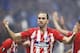 LYON, FRANCE - MAY 16: Diego Godin of Athletico Madrid celebrates after Antoine Griezmann of Athletico Madrid scores his second goal during the UEFA Europa League Final between Olympique de Marseille and Club Atletico de Madrid at Stade de Lyon on May 16, 2018 in Lyon, France. (Photo by Ian MacNicol/Getty Images)