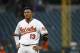 Baltimore Orioles' Manny Machado walks on the field after an at-bat during a baseball game against the New York Yankees, Tuesday, July 10, 2018, in Baltimore. (AP Photo/Patrick Semansky)
