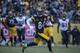 PITTSBURGH, PA - JANUARY 14: Antonio Brown #84 of the Pittsburgh Steelers carries the ball on a first down reception in the second half of the AFC Divisional Playoff game at Heinz Field on January 14, 2018 in Pittsburgh, Pennsylvania. Jaguars defeat Pittsburgh 45-42. (Photo by Brett Carlsen/Getty Images)