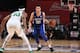 LAS VEGAS, NV - JULY 12: Kevin Knox #20 of the New York Knicks handles the ball against the Boston Celtics during the 2018 Las Vegas Summer League on July 12, 2018 at the Thomas & Mack Center in Las Vegas, Nevada. NOTE TO USER: User expressly acknowledges and agrees that, by downloading and/or using this Photograph, user is consenting to the terms and conditions of the Getty Images License Agreement. Mandatory Copyright Notice: Copyright 2018 NBAE (Photo by Garrett Ellwood/NBAE via Getty Images)