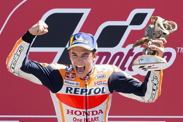 TOPSHOT - Winner Marc Marquez from Spain celebrates on the podium for the MotoGP race of the motorcycling Grand Prix at TT circuit in Assen, on July 1, 2018. (Photo by Vincent Jannink / ANP / AFP) / Netherlands OUT        (Photo credit should read VINCENT JANNINK/AFP/Getty Images)