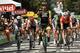 Netherlands' Dylan Groenewegen (C) celebrates as he crosses the finish line ahead of Germany's Andre Greipel (R) to win the eighth stage of the 105th edition of the Tour de France cycling race between Dreux and Amiens, northern France, on July 14, 2018. (Photo by Marco BERTORELLO / AFP) (Photo credit should read MARCO BERTORELLO/AFP/Getty Images)