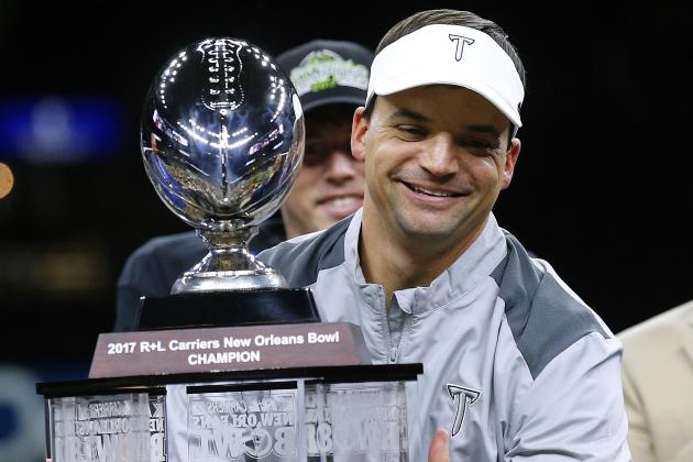 NEW ORLEANS, LA - DECEMBER 16: Head coach Neal Brown of the Troy Trojans celebrates with the trophy after the R+L Carriers New Orleans Bowl against the North Texas Mean Green at the Mercedes-Benz Superdome on December 16, 2017 in New Orleans, Louisiana. The Troy Trojans won 50-30. (Photo by Jonathan Bachman/Getty Images)