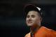Baltimore Orioles shortstop Manny Machado walks on the field between innings of the second baseball game of a doubleheader against the New York Yankees, Monday, July 9, 2018, in Baltimore. (AP Photo/Patrick Semansky)