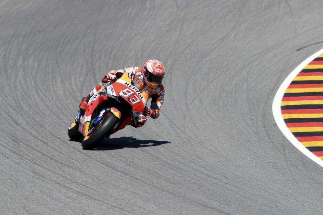 Spain's Marc Marquez of the Repsol Honda Team speeds at a free training session on the eve of the MotoGP race in Hohenstein-Ernstthal, eastern Germany, Saturday, July 14, 2018. (Hendrik Schmidt/dpa via AP)
