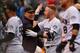 DENVER, CO - JULY 15: Trevor Story #27 and manager Bud Black #10 of the Colorado Rockies celebrate a ninth-inning walk-off home run by Story and a 4-3 win over the Seattle Mariners at Coors Field on July 15, 2018 in Denver, Colorado. (Photo by Dustin Bradford/Getty Images)