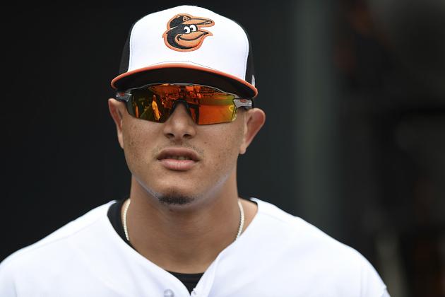 Baltimore Orioles' Manny Machado, waits in the dugout before being presented with his All-Star jersey before playing the Texas Rangers in a baseball game, Sunday, July 15, 2018, in Baltimore. (AP Photo/Gail Burton)