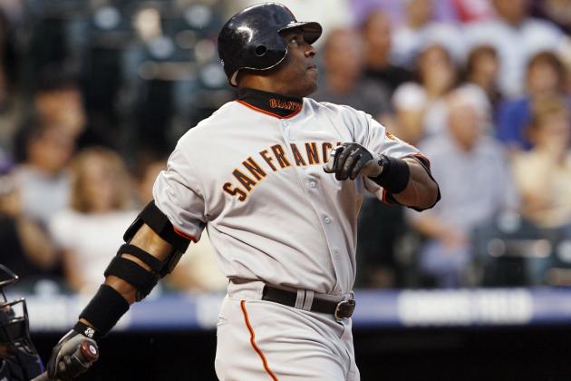 San Francisco Giants' Barry Bonds follows the flight of his two-run home run off Colorado Rockies starting pitcher Ubaldo Jimenez in the first inning of a baseball game in Denver on Wednesday, Sept. 5, 2007. (AP Photo/David Zalubowski)