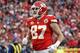 Kansas City Chiefs tight end Travis Kelce (87) runs during the first half of an NFL wild-card playoff football game in front of Tennessee Titans safety Johnathan Cyprien (37) , in Kansas City, Mo., Saturday, Jan. 6, 2018. (AP Photo/Charlie Riedel)