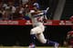 ANAHEIM, CA - JULY 06: Yasiel Puig #66 of the Los Angeles Dodgers bats during the fifth inning of the MLB game against the Los Angeles Angels of Anaheim at Angel Stadium on July 6, 2018 in Anaheim, California. The Angels defeated the Dodgers 3-2. (Photo by Victor Decolongon/Getty Images)