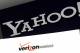 FILE - This Monday, July 25, 2016, file photo shows Yahoo and Verizon logos on a laptop, in North Andover, Mass. Verizon is pushing further into sports streaming with a new NBA deal that will let Yahoo users watch some out-of-market games. (AP Photo/Elise Amendola, File)