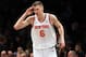 NEW YORK, NY - JANUARY 15: Kristaps Porzingis #6 of the New York Knicks celebrates after a basket against the Brooklyn Nets during their game at the Barclays Center on January 15, 2018 in New York City. . User expressly acknowledges and agrees that, by downloading and/or using this Photograph, user is consenting to the terms and conditions of the Getty Images License Agreement. (Photo by Al Bello/Getty Images)