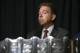 NCAA college football head coach Nick Saban of Alabama listens to the ceremony before being presented The MacArthur Bowl trophy, in front of him, during the Southeastern Conference Media Days at the College Football Hall of Fame in Atlanta, Wednesday, July 18, 2018. The trophy is presented annually, since 1959, to the top team in the country. (AP Photo/John Amis)