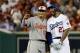 WASHINGTON, DC - JULY 17: Manny Machado #13 of the Baltimore Orioles and the American League and Matt Kemp #27 of the Los Angeles Dodgers and the National League pose for a selfie in the second inning during the 89th MLB All-Star Game, presented by Mastercard at Nationals Park on July 17, 2018 in Washington, DC. (Photo by Patrick Smith/Getty Images)