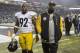 SEATTLE, WA - NOVEMBER 29: Linebacker James Harrison #92 of the Pittsburgh Steelers and head coach Mike Tomlin walk off the field after a football game against the Seattle Seahawks at CenturyLink Field on November 29, 2015 in Seattle, Washington. The Seahawks won the game 39-30. (Photo by Stephen Brashear/Getty Images)