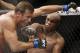 FILE - In this Oct. 14, 2012, file photo, Brazil's Anderson Silva, right, throws a punch at Stephan Bonnar, of the United States, during their light heavyweight mixed martial arts bout at UFC 153 in Rio de Janeiro, Brazil. Nevada fight regulators imposed the maximum penalty Thursday, Aug. 13, 2015 on former UFC champion Silva for testing positive for steroid use in January, 2015. Nevada Athletic Commission Chairman Francisco Aguilar said the 40-year-old Silva was suspended for one year, stripped of his January win over Nick Diaz and fined $380,000. (AP Photo/Felipe Dana, File)