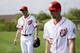 Washington Nationals pitchers Max Scherzer, left, and Stephen Strasburg walk on the field during a spring training baseball workout, Sunday, March 1, 2015, in Viera, Fla. (AP Photo/David Goldman)