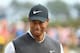 CARNOUSTIE, SCOTLAND - JULY 21: Tiger Woods of the United States smiles on the ninth hole during the third round of the 147th Open Championship at Carnoustie Golf Club on July 21, 2018 in Carnoustie, Scotland. (Photo by Andrew Redington/Getty Images)