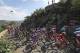 The pack climbs during the fourteenth stage of the Tour de France cycling race over 188 kilometers (116.8 miles) with start in Saint-Paul Trois-Chateaux and Mende, France, Saturday July 21, 2018. (AP Photo/Peter Dejong)