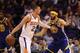 PHOENIX, AZ - APRIL 08: Alex Len #21 of the Phoenix Suns handles the ball against JaVale McGee #1 of the Golden State Warriors during the first half of the NBA game at Talking Stick Resort Arena on April 8, 2018 in Phoenix, Arizona. NOTE TO USER: User expressly acknowledges and agrees that, by downloading and or using this photograph, User is consenting to the terms and conditions of the Getty Images License Agreement. (Photo by Christian Petersen/Getty Images)