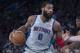 Detroit Pistons center Andre Drummond handles the ball during the first half of an NBA basketball game against the New York Knicks, Saturday, March 31, 2018, at Madison Square Garden in New York. (AP Photo/Mary Altaffer)