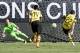 Liverpool's goalkeeper Loris Karius (L) is scored upon by Borussia Dortmund's Christian Pulisic (R) from a free kick during the 2018 International Champions Cup at Bank of America Stadium in Charlotte, North Carolina, on July 22, 2018. (Photo by JIM WATSON / AFP) (Photo credit should read JIM WATSON/AFP/Getty Images)