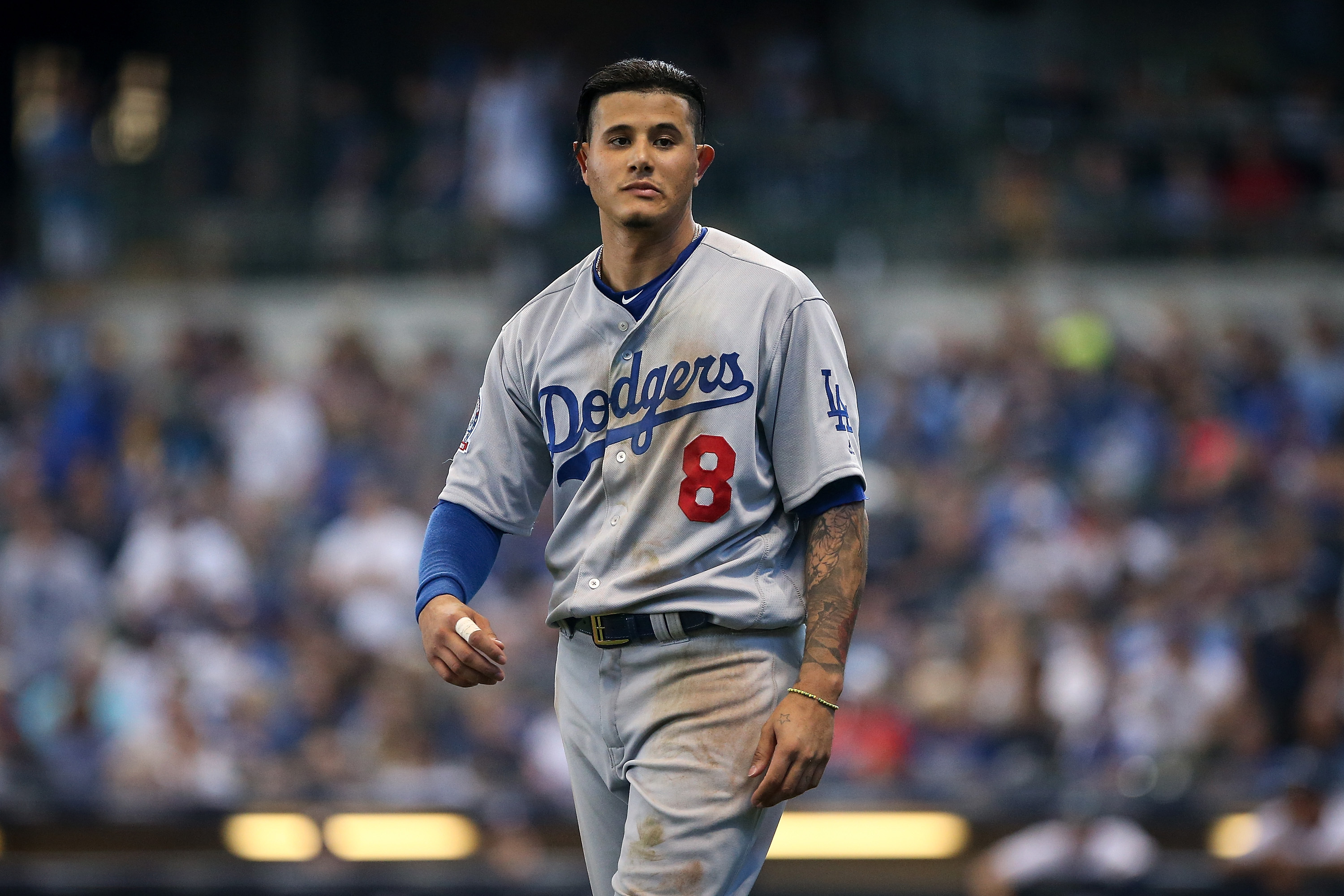 Dayton from Nebraska on X: for all the troubles the Dodgers may be in for  signing international players, the real crime is Manny Machado's hair   / X