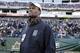 Former San Antonio Spurs basketball star David Robinson watches from the Notre Dame sideline during the first half of the Music City Bowl NCAA college football game between Notre Dame and LSU on Tuesday, Dec. 30, 2014, in Nashville, Tenn. (AP Photo/Mark Humphrey)
