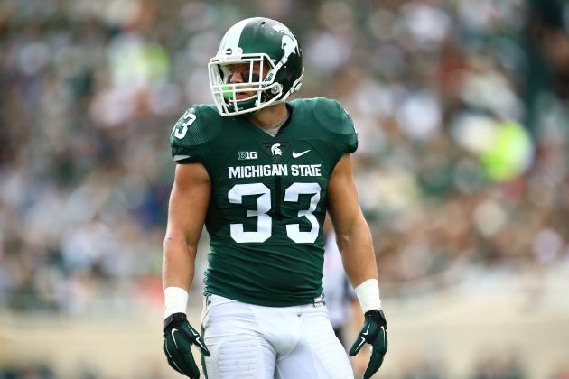 EAST LANSING, MI - SEPTEMBER 19: Jon Reschke #33 of the Michigan State Spartans during the game against the Air Force Falcons at Spartan Stadium on September 19, 2015 in East Lansing, Michigan. (Photo by Rey Del Rio/Getty Images)