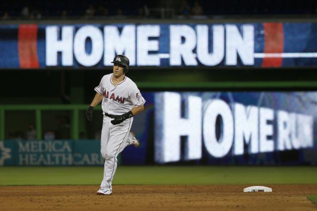Miami Marlins' J.T. Realmuto rounds second base after he hit a home run during the fifth inning of a baseball game against the Tampa Bay Rays, Monday, July 2, 2018, in Miami. (AP Photo/Wilfredo Lee)