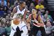 OAKLAND, CA - DECEMBER 11: Kevin Durant #35 of the Golden State Warriors dribbling the ball backs in on CJ McCollum #3 of the Portland Trail Blazers during an NBA basketball game at ORACLE Arena on December 11, 2017 in Oakland, California. NOTE TO USER: User expressly acknowledges and agrees that, by downloading and or using this photograph, User is consenting to the terms and conditions of the Getty Images License Agreement. (Photo by Thearon W. Henderson/Getty Images)