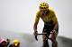 TOPSHOT - Great Britain's Geraint Thomas, wearing the overall leader's yellow jersey, crosses the finish line ta place third of the 17th stage of the 105th edition of the Tour de France cycling race, between Bagneres-de-Luchon and Saint-Lary-Soulan Col du Portet, southwestern France, on July 25, 2018. (Photo by Jeff PACHOUD / AFP) (Photo credit should read JEFF PACHOUD/AFP/Getty Images)