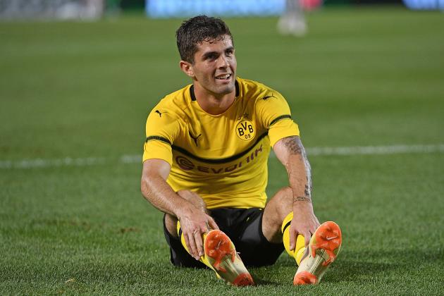 PITTSBURGH, PA - JULY 25: Christian Pulisic #22 of Borussia Dortmund sits on the field after attempting a shot in the first half during the 2018 International Champions Cup match against Benfica at Heinz Field on July 25, 2018 in Pittsburgh, Pennsylvania. (Photo by Justin Berl/Getty Images)