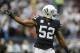 Oakland Raiders defensive end Khalil Mack (52) gestures during the first half of an NFL football game against the Denver Broncos in Oakland, Calif., Sunday, Nov. 26, 2017. (AP Photo/D. Ross Cameron)
