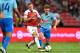 SINGAPORE - JULY 26: Luciano Vietto #17 of Atletico Madrid and Aaron Ramsey #8 of Arsenal competes for the ball during the International Champions Cup 2018 match between Club Atletico de Madrid and Arsenal at the National Stadium on July 26, 2018 in Singapore. (Photo by Thananuwat Srirasant/Getty Images for ICC)