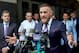 Irish mixed martial arts superstar Conor McGregor talks to the press after he pleaded guilty to a single violation of disorderly conduct, in Brooklyn Criminal Court on July 26, 2018. - The 30-year-old, who is nicknamed 'The Notorious,' had been charged with multiple counts of assault and criminal mischief after attacking a bus filled with UFC fighters at the Barclays Center. He pleaded guilty to a lesser charge of disorderly conduct in a fleeting court appearance, and was handed a punishment of five days' community service. (Photo by Timothy A. CLARY / AFP) / ALTERNATIVE CROP (Photo credit should read TIMOTHY A. CLARY/AFP/Getty Images)
