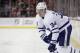 Toronto Maple Leafs center Auston Matthews skates with the puck against the New Jersey Devils during the first period of an NHL hockey game, Thursday, April 5, 2018, in Newark, N.J. (AP Photo/Julio Cortez)
