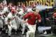   DOSSIER - In this January 8, 2018, file photo, Alabama coach, Nick Saban, leads his team to the field before the NCAA championship game against Georgia in Atlanta . Saban should feel at home at the College Football Hall of Fame, which hosts part of the SEC's media days this week. The downtown Atlanta Hall of Fame is just steps away from the Mercedes-Benz Stadium, where six months ago, the Saban team in Alabama beat Georgia for its sixth championship national. (AP Photo / David Goldman, File) 