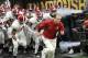 FILE - In this Jan. 8, 2018, file photo, Alabama coach Nick Saban leads his team onto the field before the NCAA college football playoff championship game against Georgia in Atlanta. Saban should feel right at home at the College Football Hall of Fame, the facility hosting part of this week's SEC media days. The Hall of Fame in downtown Atlanta is only a short walk from Mercedes-Benz Stadium, where six months ago Saban’s Alabama team beat Georgia for his sixth national championship. (AP Photo/David Goldman, File)