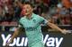 Mesut Ozil of Arsenal celebrates after scoring during the International Champions Cup football match between Arsenal and Paris Saint-Germain in Singapore on July 28, 2018. (Photo by ROSLAN RAHMAN / AFP) (Photo credit should read ROSLAN RAHMAN/AFP/Getty Images)