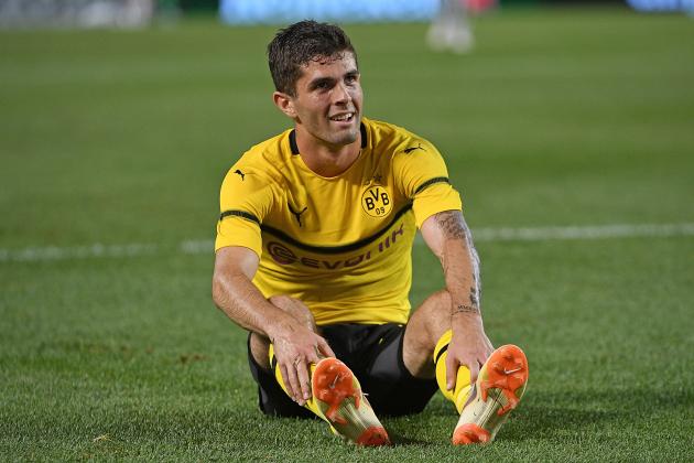 PITTSBURGH, PA - JULY 25: Christian Pulisic #22 of Borussia Dortmund sits on the field after attempting a shot in the first half during the 2018 International Champions Cup match against Benfica at Heinz Field on July 25, 2018 in Pittsburgh, Pennsylvania. (Photo by Justin Berl/Getty Images)