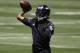 Baltimore Ravens quarterback Robert Griffin III throws a pass during an NFL football organized team activity at the team's headquarters in Owings Mills, Md., Thursday, May 24, 2018. (AP Photo/Patrick Semansky)