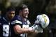 Los Angeles Chargers' Joey Bosa takes off his helmet during NFL football practice, Sunday, July 29, 2018, in Costa Mesa, Calif. (AP Photo/Jae C. Hong)
