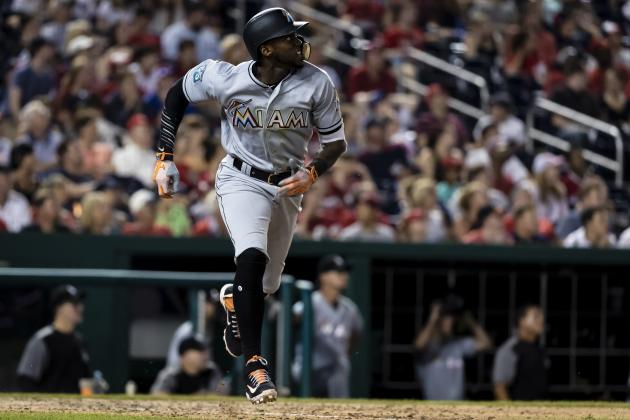 WASHINGTON, DC - JULY 06: Cameron Maybin #1 of the Miami Marlins watches a long fly ball that was ulitmately caught by Bryce Harper #34 of the Washington Nationals (not pictured) during the ninth inning at Nationals Park on July 06, 2018 in Washington, DC.  (Photo by Scott Taetsch/Getty Images)