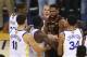 Cleveland Cavaliers center Tristan Thompson, facing, confronts Golden State Warriors forward Draymond Green, second from bottom left, during overtime of Game 1 of basketball's NBA Finals in Oakland, Calif., Thursday, May 31, 2018. The Warriors won 124-114. (AP Photo/Ben Margot)