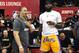 LAS VEGAS, NV - JULY 15: Head coach Tyronn Lue (L) of the Cleveland Cavaliers talks with LeBron James of the Los Angeles Lakers after a quarterfinal game of the 2018 NBA Summer League between the Lakers and the Detroit Pistons at the Thomas & Mack Center on July 15, 2018 in Las Vegas, Nevada. NOTE TO USER: User expressly acknowledges and agrees that, by downloading and or using this photograph, User is consenting to the terms and conditions of the Getty Images License Agreement. (Photo by Ethan Miller/Getty Images)