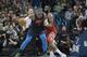 OKLAHOMA CITY, OK - DECEMBER 25: James Harden #13 of the Houston Rockets blocks Carmelo Anthony #7 of the Oklahoma City Thunder during the second half of a NBA game at the Chesapeake Energy Arena on December 25, 2017 in Oklahoma City, Oklahoma. The Thunder defeated the Rockets 112-107. NOTE TO USER: User expressly acknowledges and agrees that, by downloading and or using this photograph, User is consenting to the terms and conditions of the Getty Images License Agreement. (Photo by J Pat Carter/Getty Images)