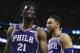 Philadelphia 76ers center Joel Embiid (21) and guard Ben Simmons (25) have words during a break in the fourth quarter of Game 2 of an NBA basketball second-round playoff series against the Boston Celtics, Thursday, May 3, 2018, in Boston. (AP Photo/Elise Amendola)