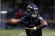Baltimore Ravens quarterback Lamar Jackson throws a pass during an NFL football training camp practice at the team's headquarters in Owings Mills, Md., Thursday, July 19, 2018. (AP Photo/Patrick Semansky)